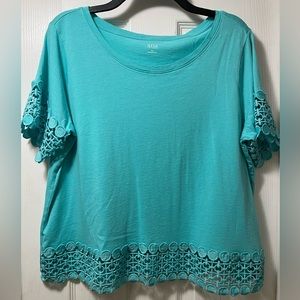 Turquoise short sleeve top with crochet detail on sleeves and bottom